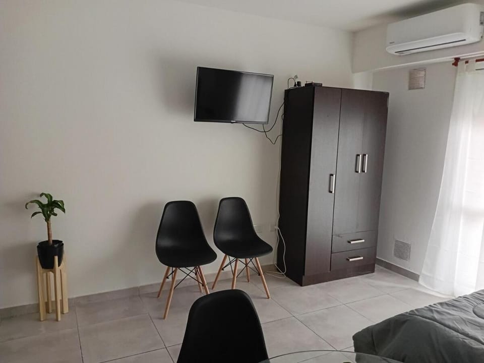 Communal lounge/ TV room, wardrobe, air conditioner