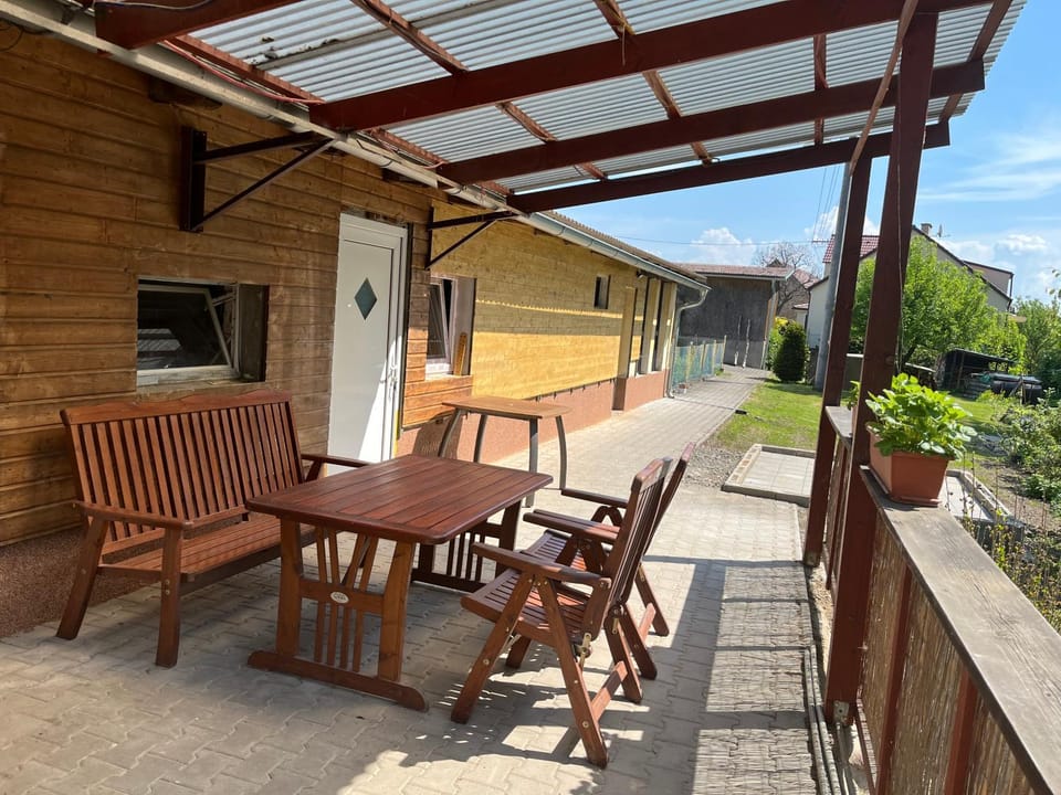 Property building, Patio, Garden, View (from property/room), Balcony/Terrace, Seating area, Garden view