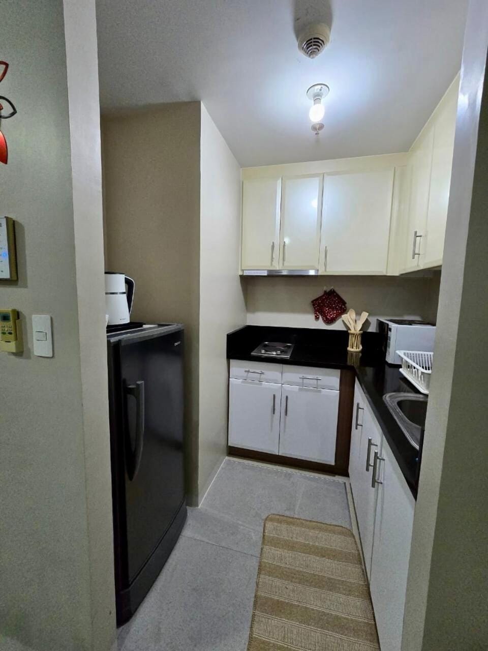 Kitchen or kitchenette, stove, toaster