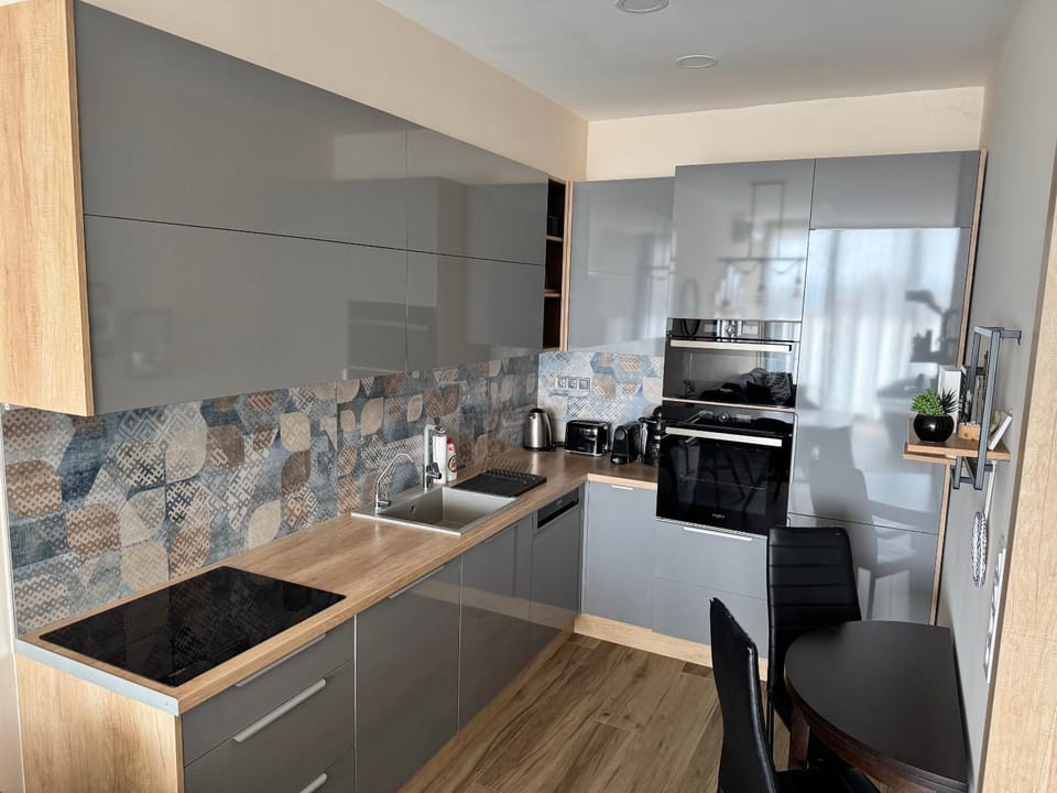 Kitchen or kitchenette, oven, stove