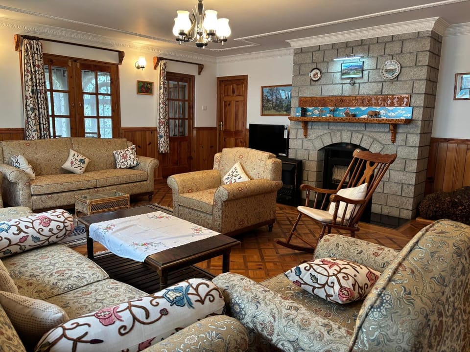 Communal lounge/ TV room, Seating area, fireplace, furniture