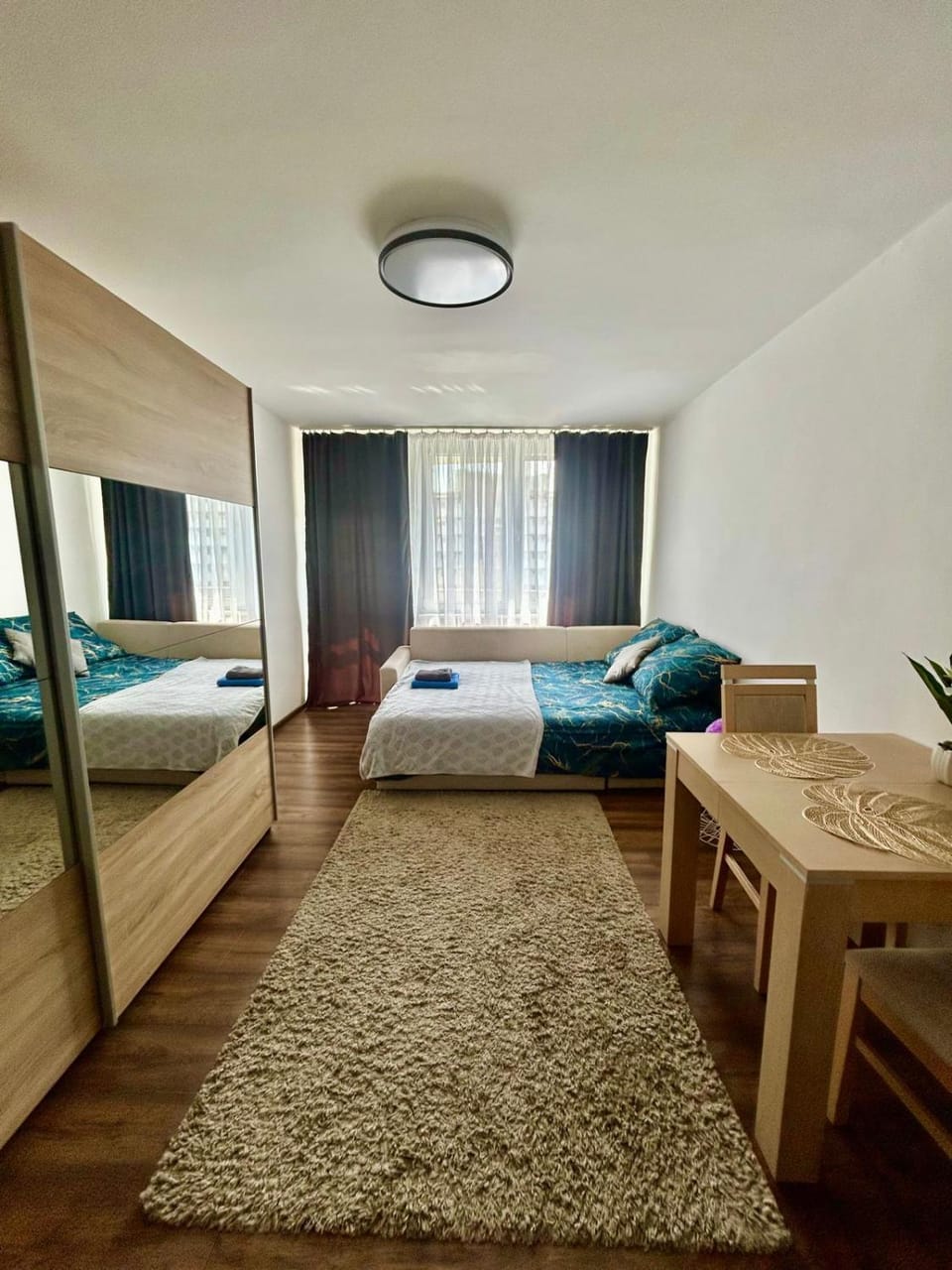 Communal lounge/ TV room, Bed, Dining area, wardrobe