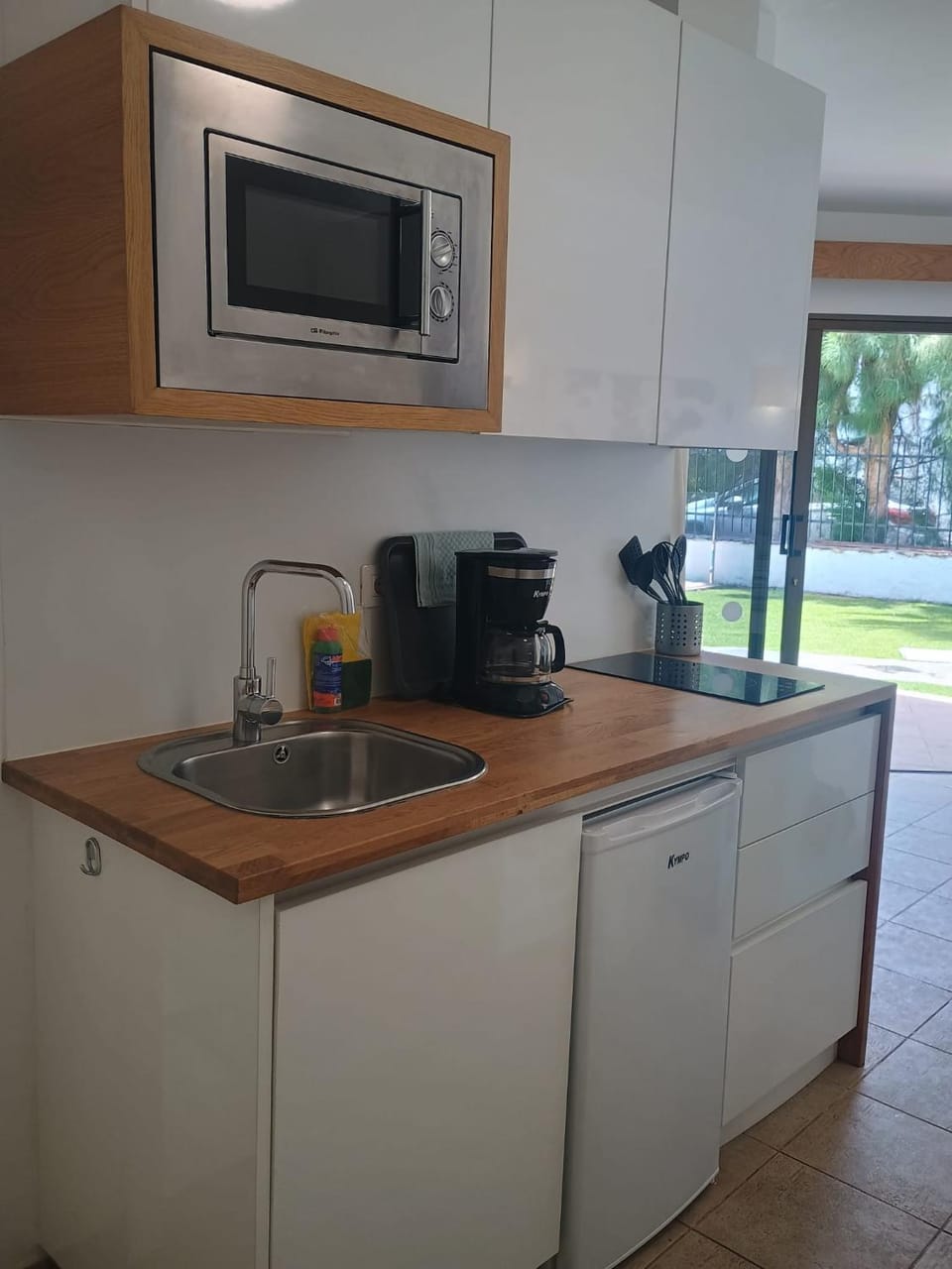 Kitchen or kitchenette, stove, toaster