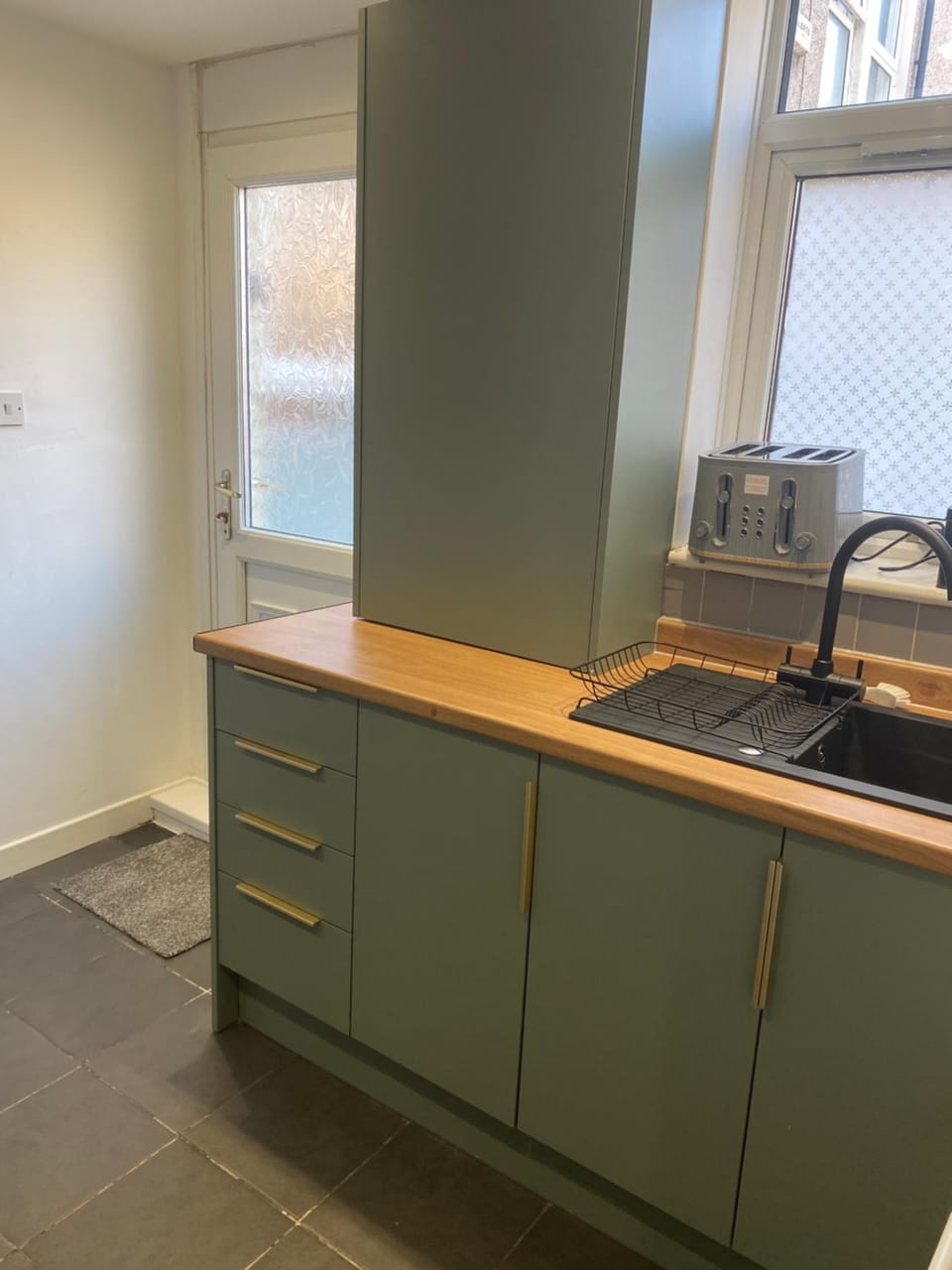 Kitchen or kitchenette, toaster