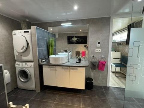 Shower, Bathroom, towels, washing machine, dryer