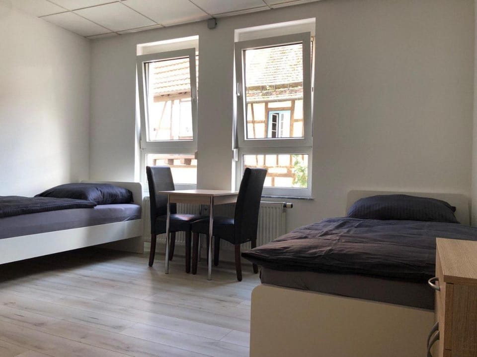 Bed, Seating area, Dining area, Bedroom