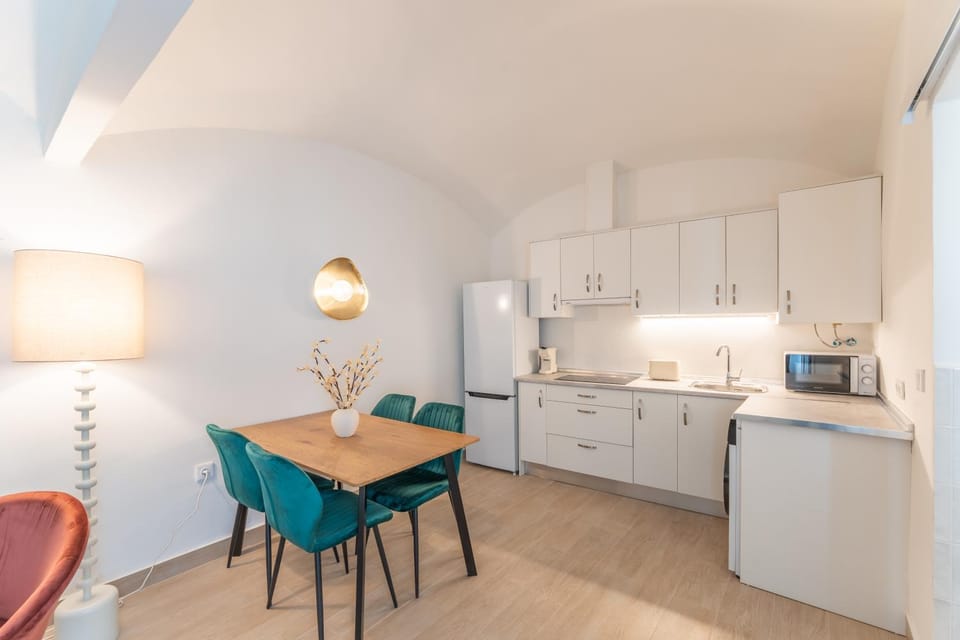 Kitchen or kitchenette, Dining area, microwave, stove, washing machine