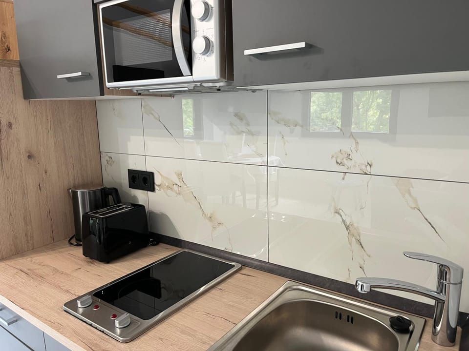 Kitchen or kitchenette, stove