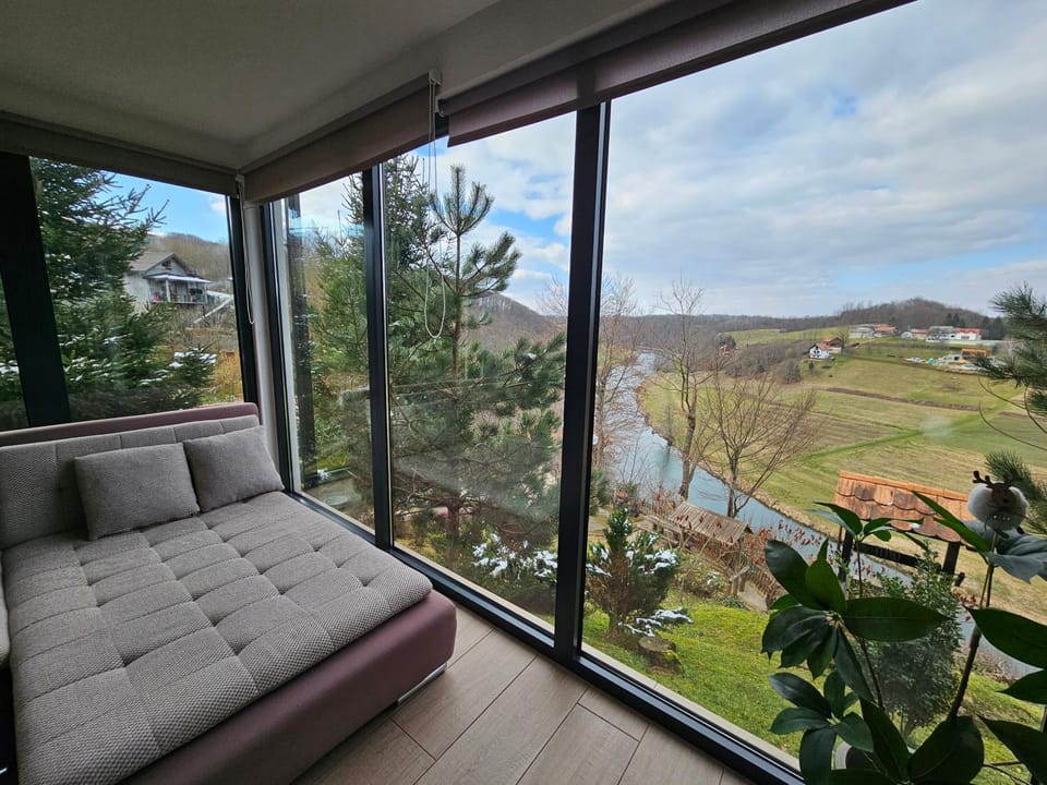 Day, Natural landscape, View (from property/room), Living room, Seating area, Garden view, Mountain view, River view