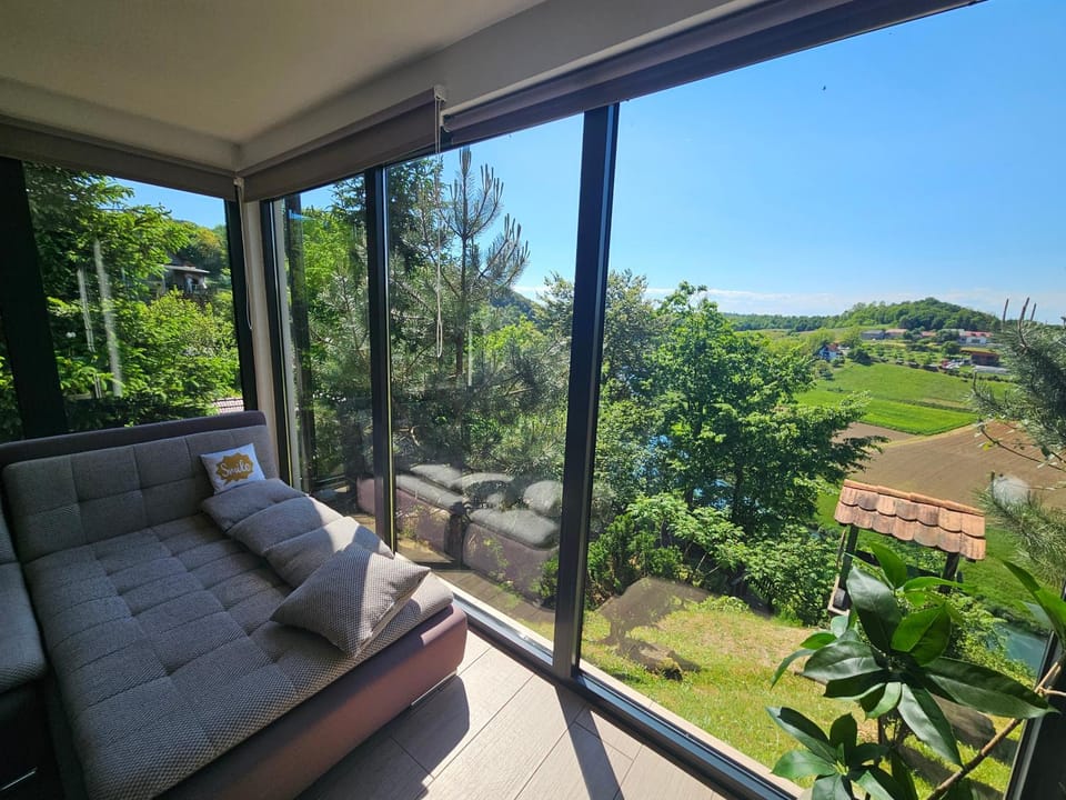 Communal lounge/ TV room, Spring, View (from property/room), View (from property/room), Living room, Seating area, Garden view, Garden view, Mountain view, Mountain view, River view, River view