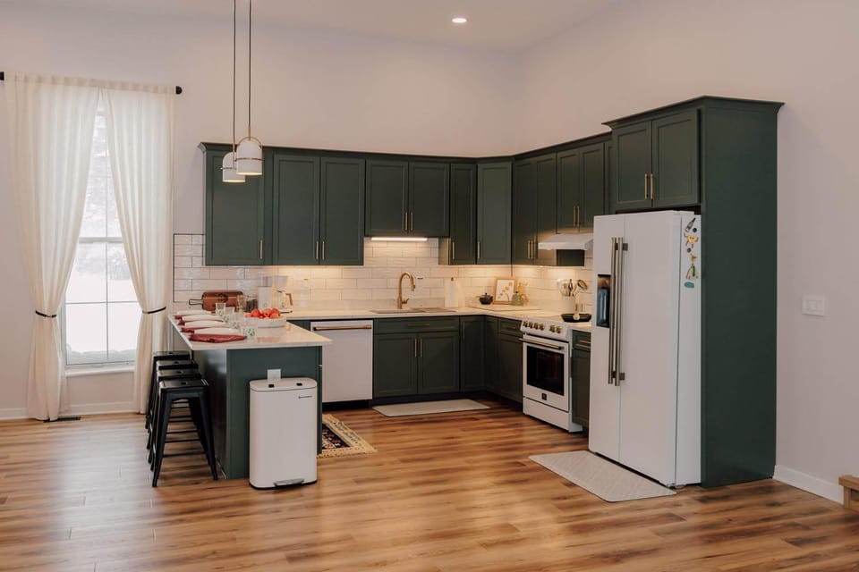 Kitchen or kitchenette, dishwasher, oven, stove, toaster