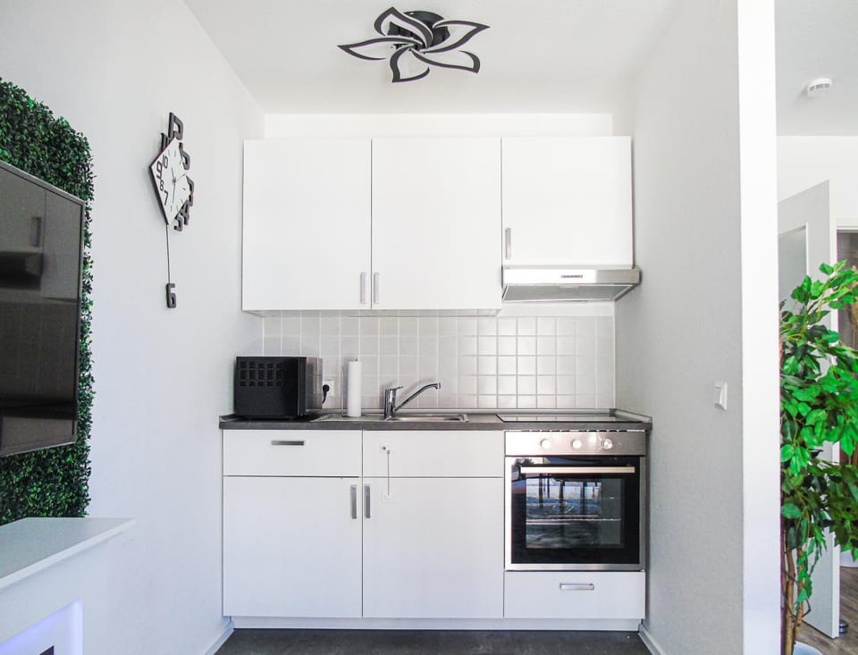 Kitchen or kitchenette, oven