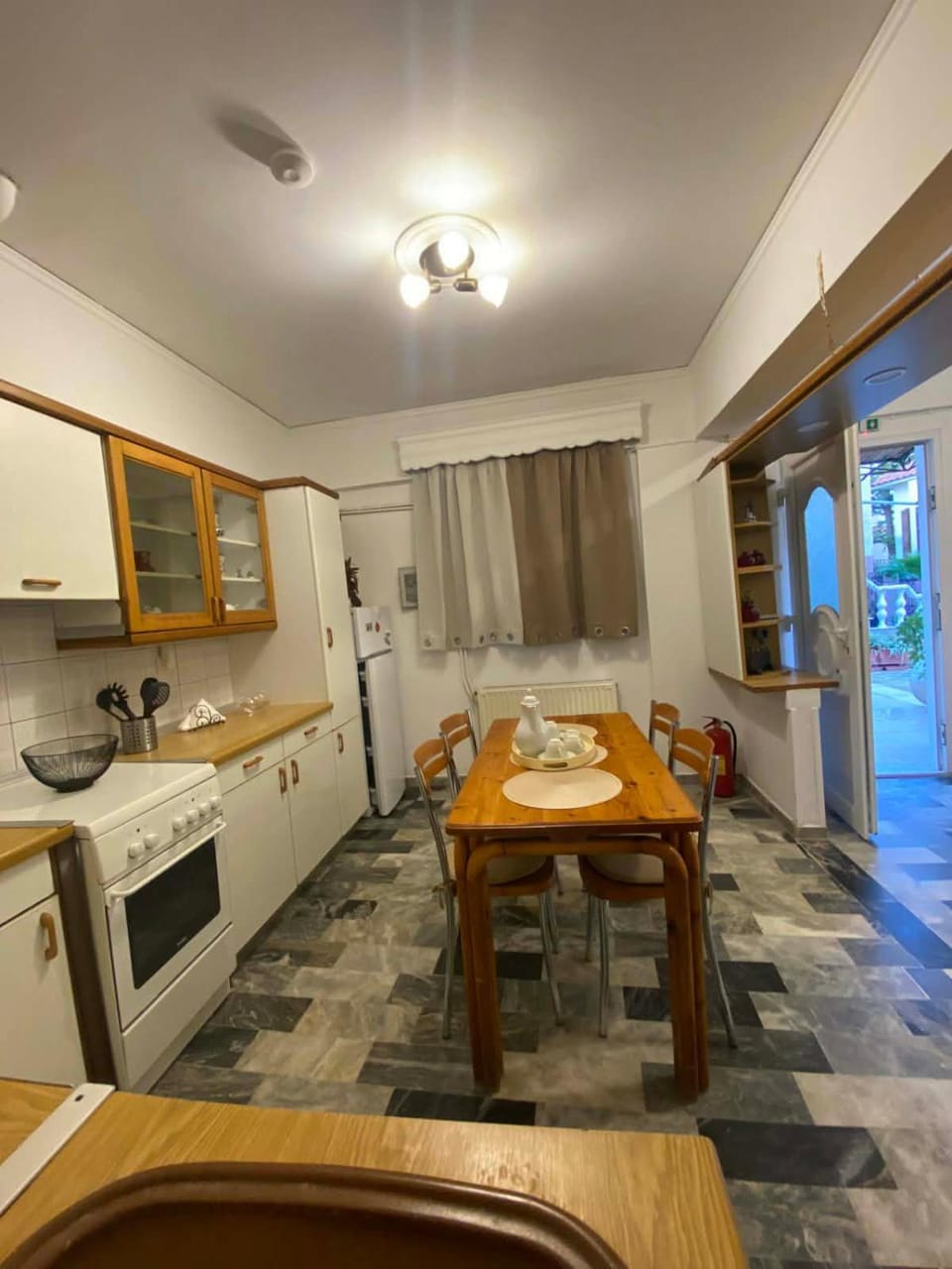 Kitchen or kitchenette, oven, stove