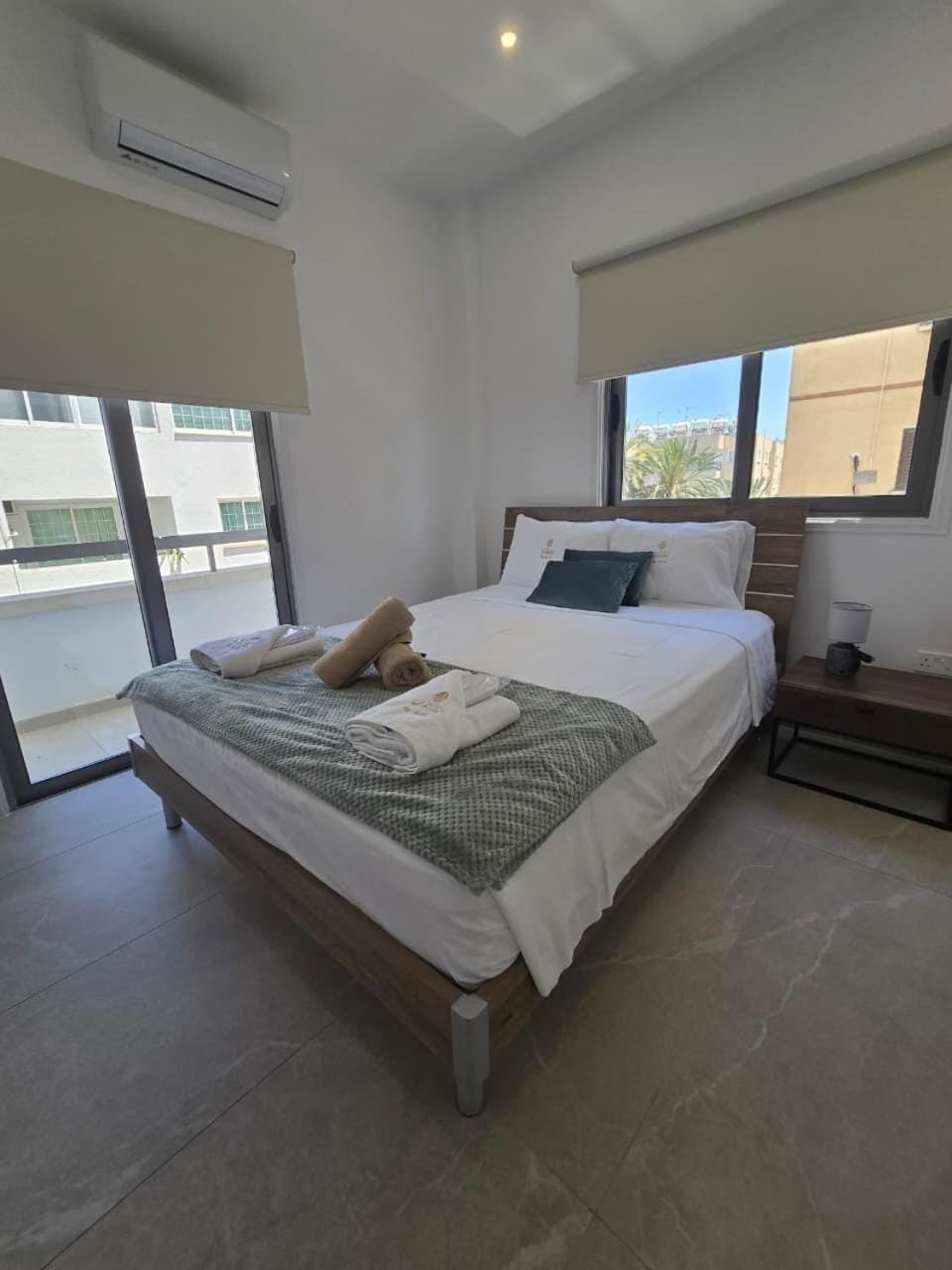 Bed, Photo of the whole room, Bedroom, towels, air conditioner
