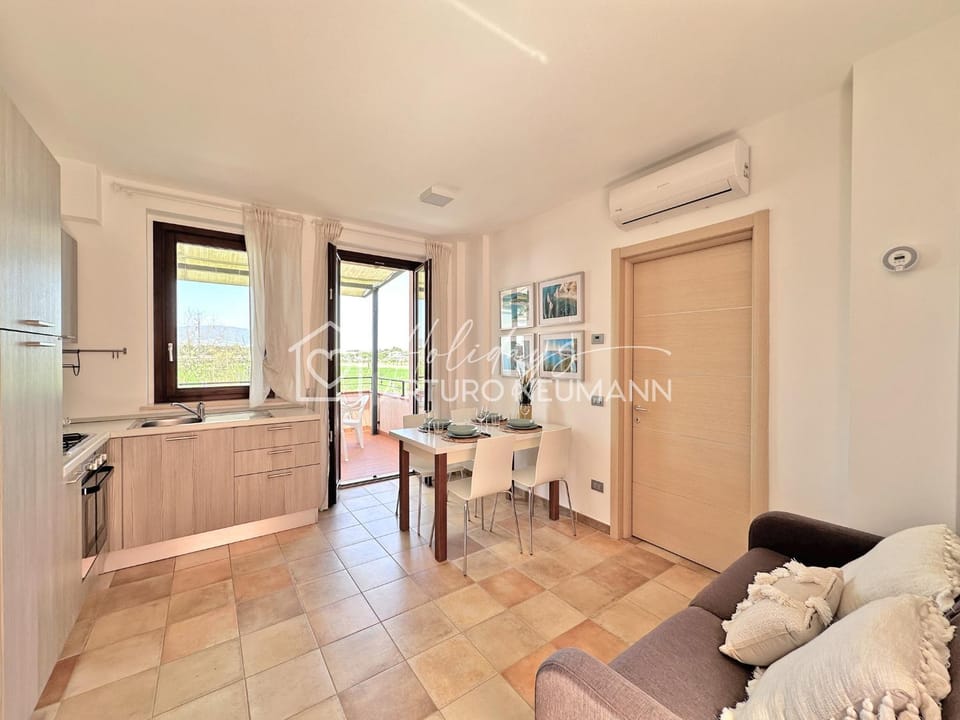 Kitchen or kitchenette, Living room, Seating area, Dining area, air conditioner