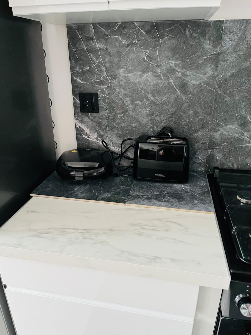 Kitchen or kitchenette, toaster