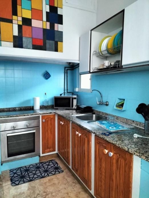 Kitchen or kitchenette, oven, stove
