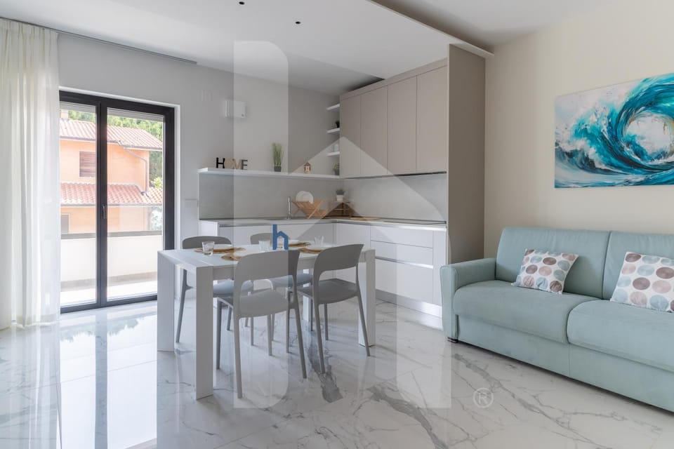 Kitchen or kitchenette, Living room, Seating area, Dining area