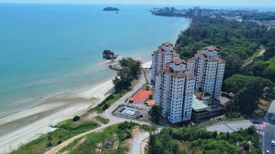 Property building, Nearby landmark, Day, Natural landscape, Beach, City view, Sea view