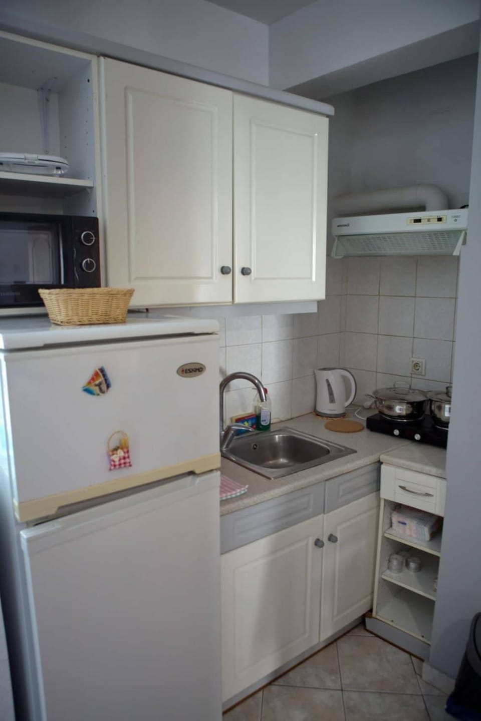 Kitchen or kitchenette, stove, kitchen
