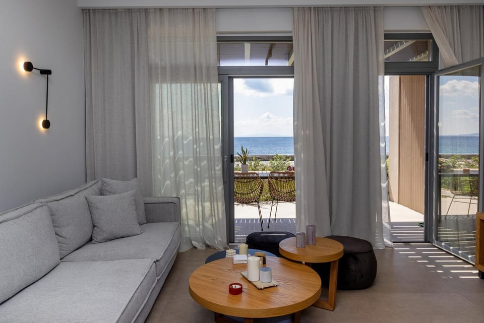 View (from property/room), Living room, Seating area, Sea view