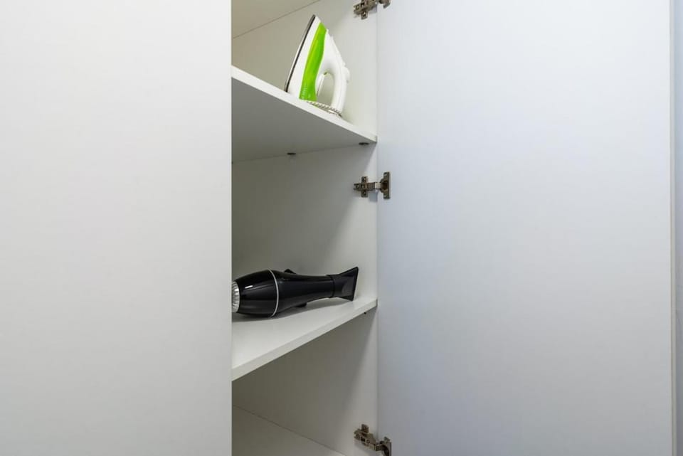 Bedroom, flat iron, hair dryier, wardrobe