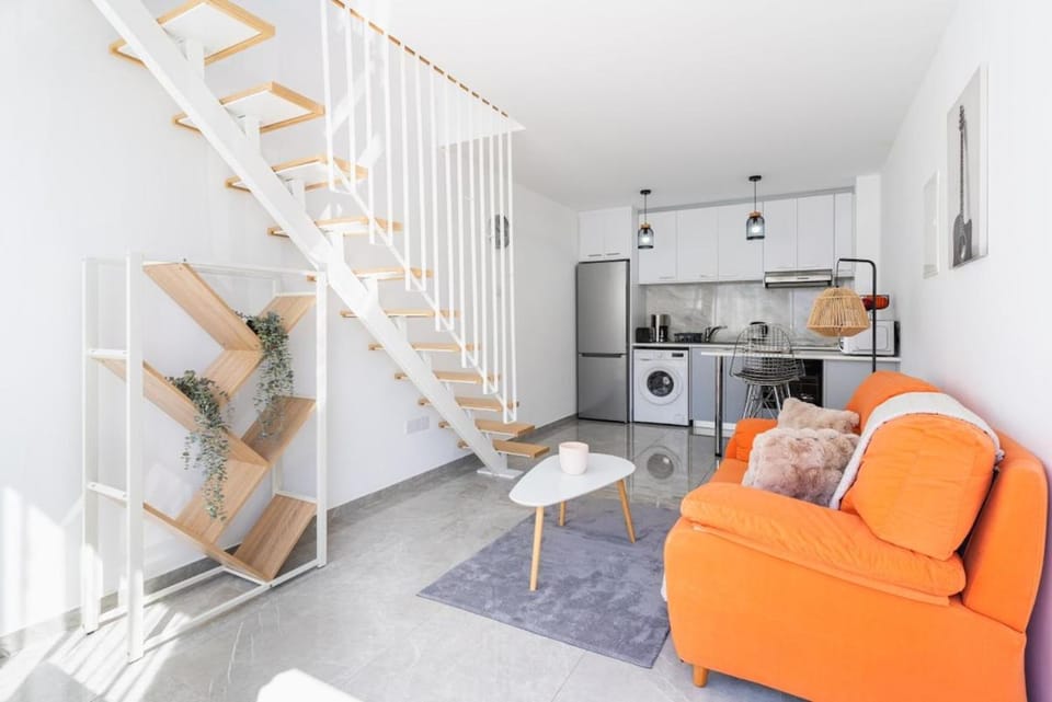 Kitchen or kitchenette, Living room, Decorative detail, Seating area, air conditioner