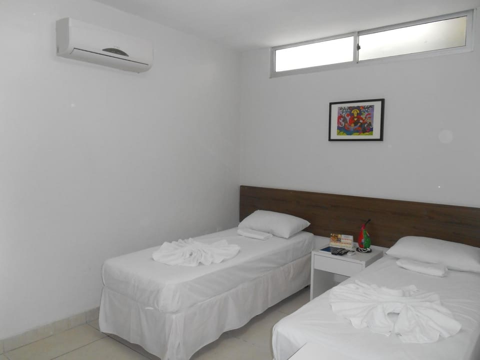 Bed, Photo of the whole room, Bedroom, towels, air conditioner