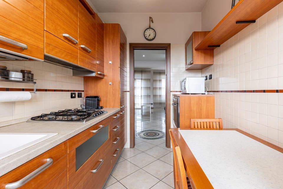 Kitchen or kitchenette, dishwasher, oven, stove