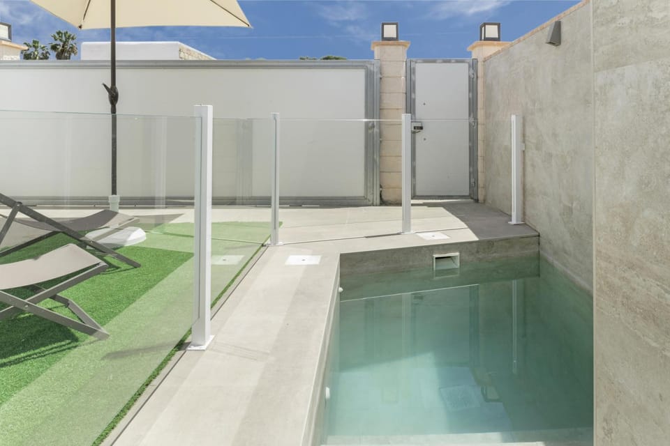 Property building, Living room, Swimming pool