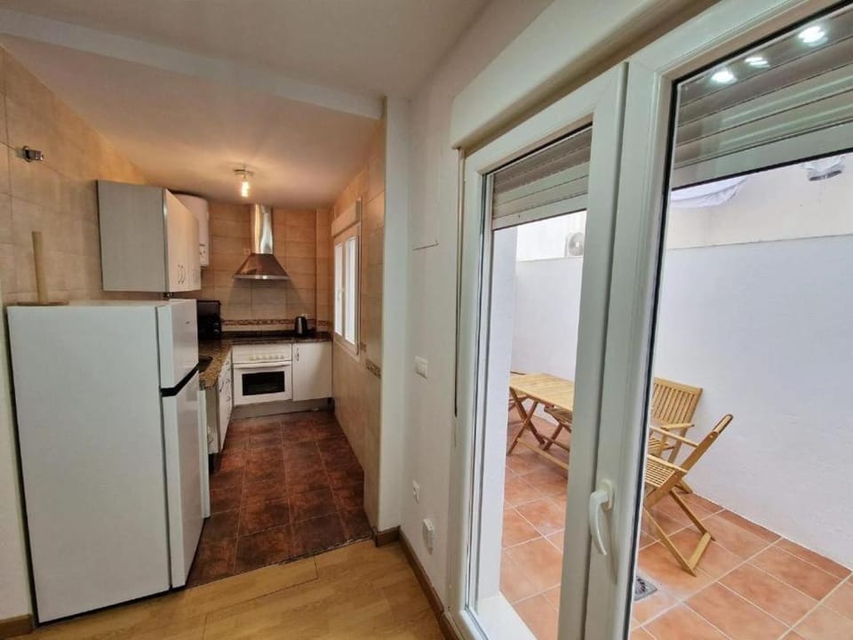 Kitchen or kitchenette, oven, stove