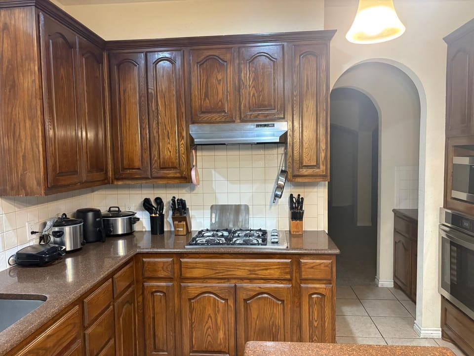 Kitchen or kitchenette, stove