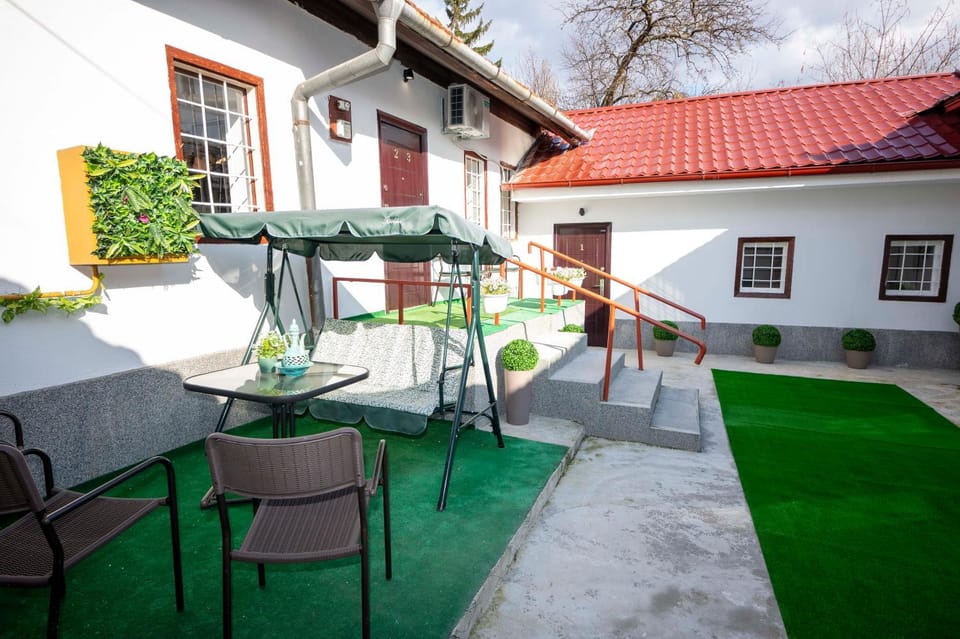 Property building, Patio, Spring, Day, Garden, View (from property/room), Garden view, Inner courtyard view