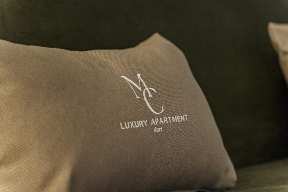 Bed, Property logo or sign, Logo/Certificate/Sign, Text overlay, Certificate/Award