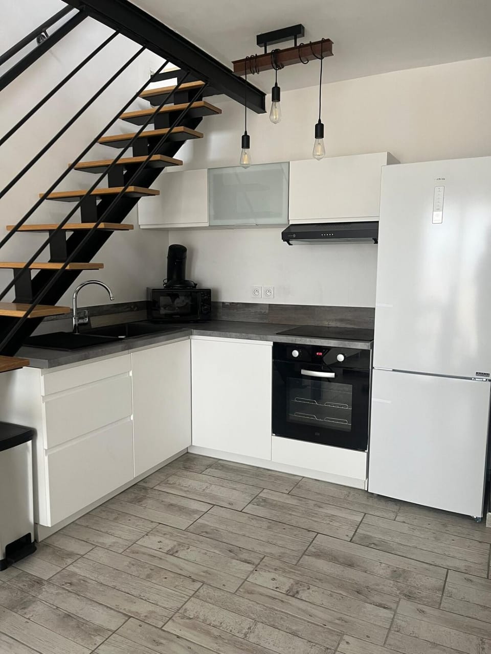 Kitchen or kitchenette, oven, stove, toaster