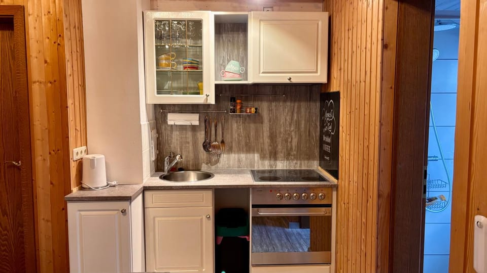Kitchen or kitchenette, stove