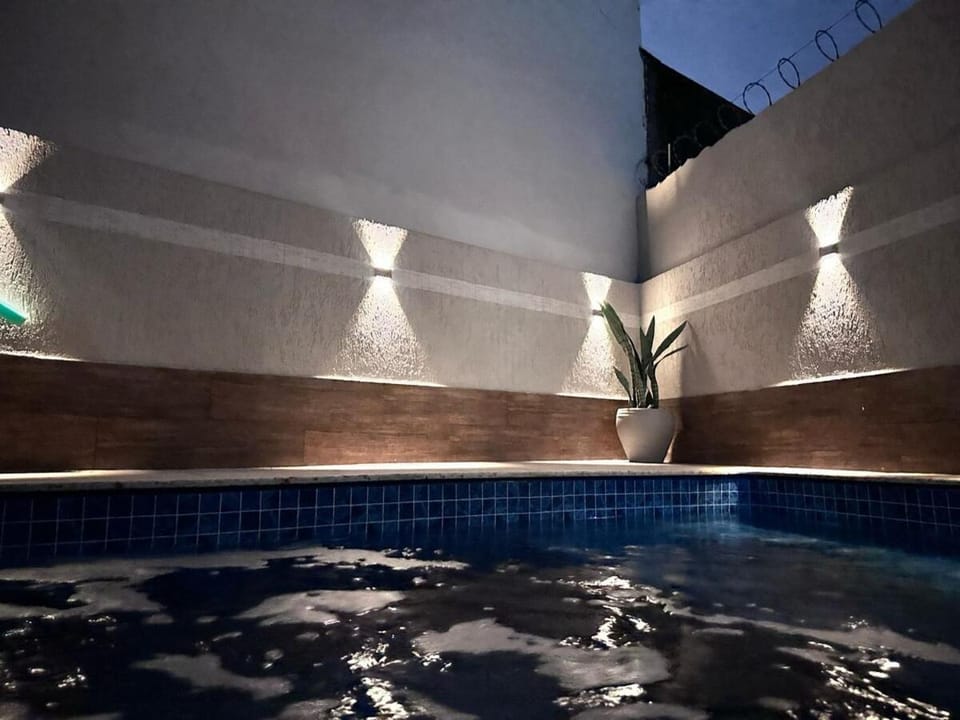 A Casa de Praia com ar, piscina aquecida e churrasqueira House in Itanhaém