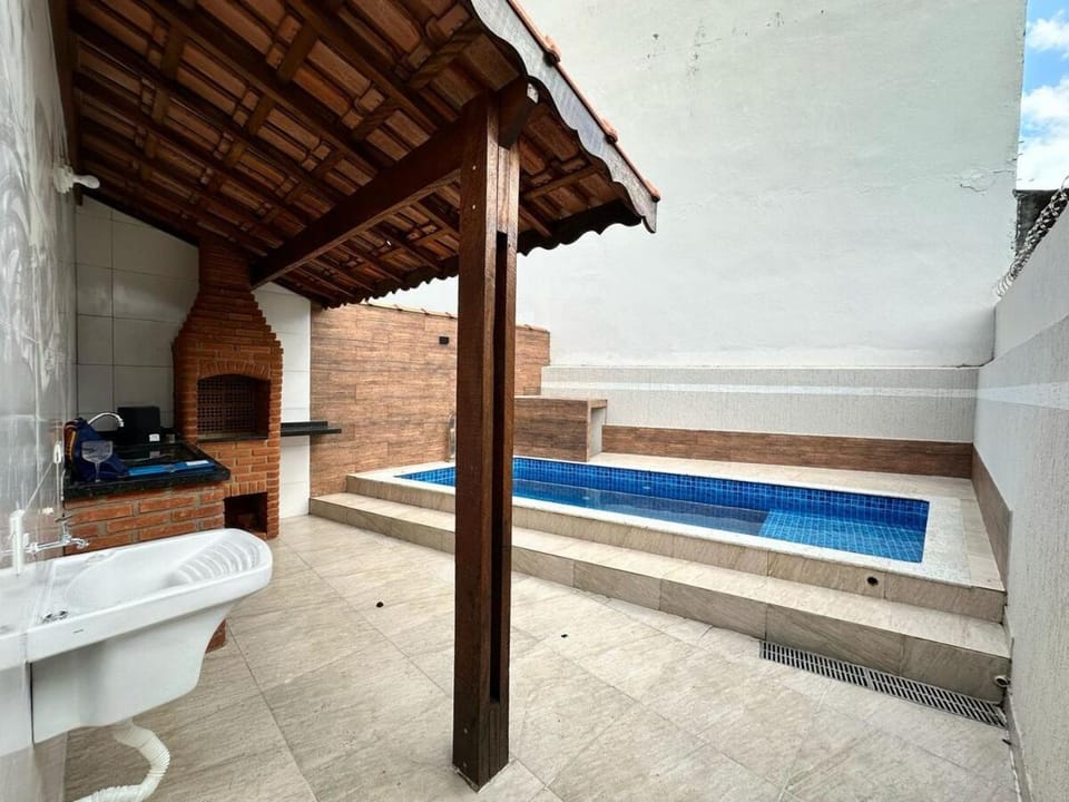 A Casa de Praia com ar, piscina aquecida e churrasqueira House in Itanhaém