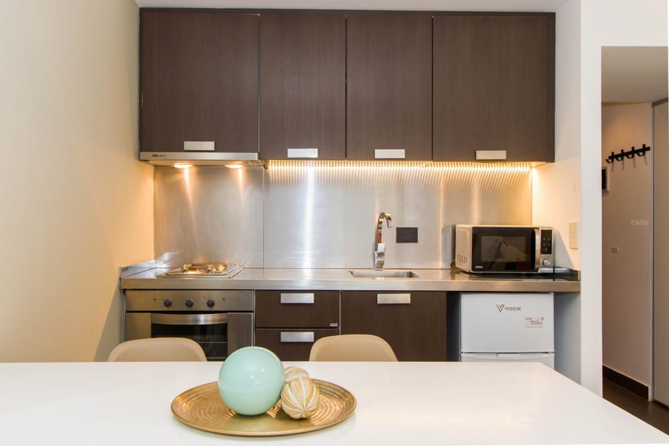 Kitchen or kitchenette, oven, stove, toaster