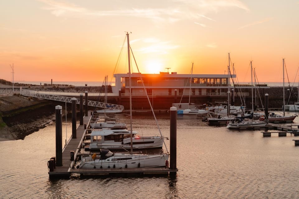 Yacht by Strandhotel - hotel service & wellness Docked boat in Zeeland, Netherlands