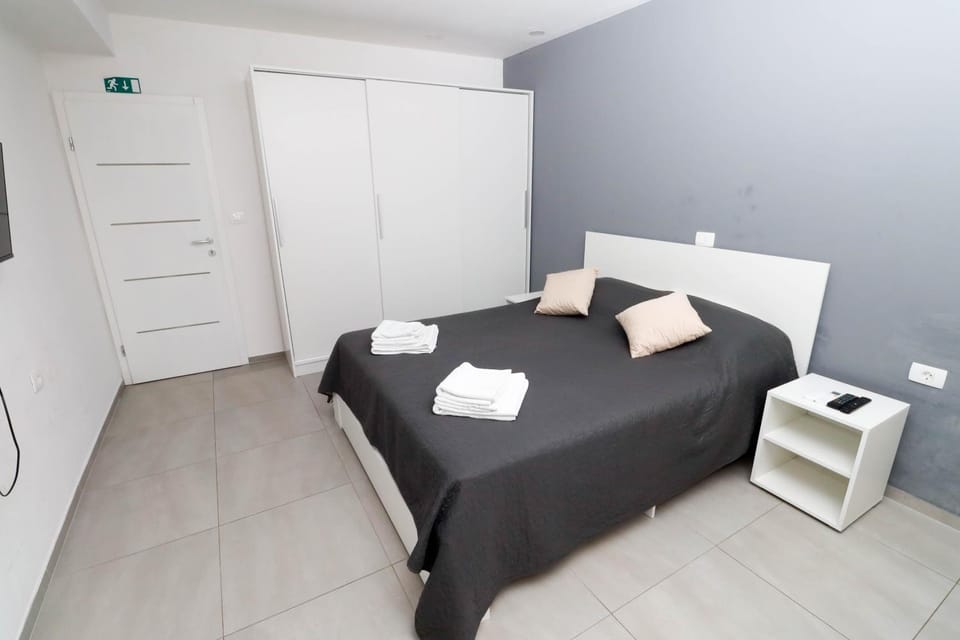 Bed, Photo of the whole room, Bedroom, towels, wardrobe
