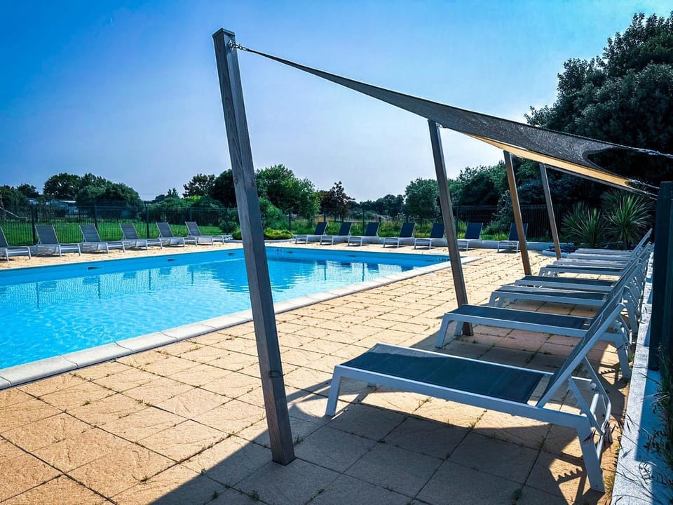 Maison mitoyenne de vacances - piscine commune et espaces verts - 4 personnes House in Talmont-Saint-Hilaire