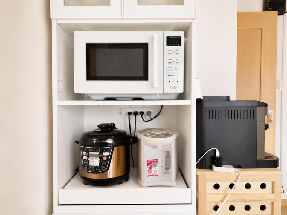 Kitchen or kitchenette, microwave
