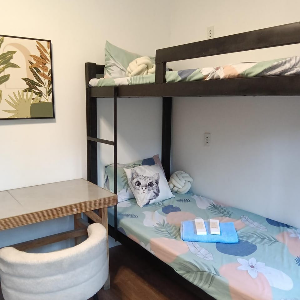 Bed, Photo of the whole room, Bedroom, bunk bed, hair dresser, towels