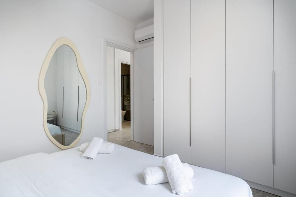 Bed, Bedroom, towels, wardrobe, air conditioner