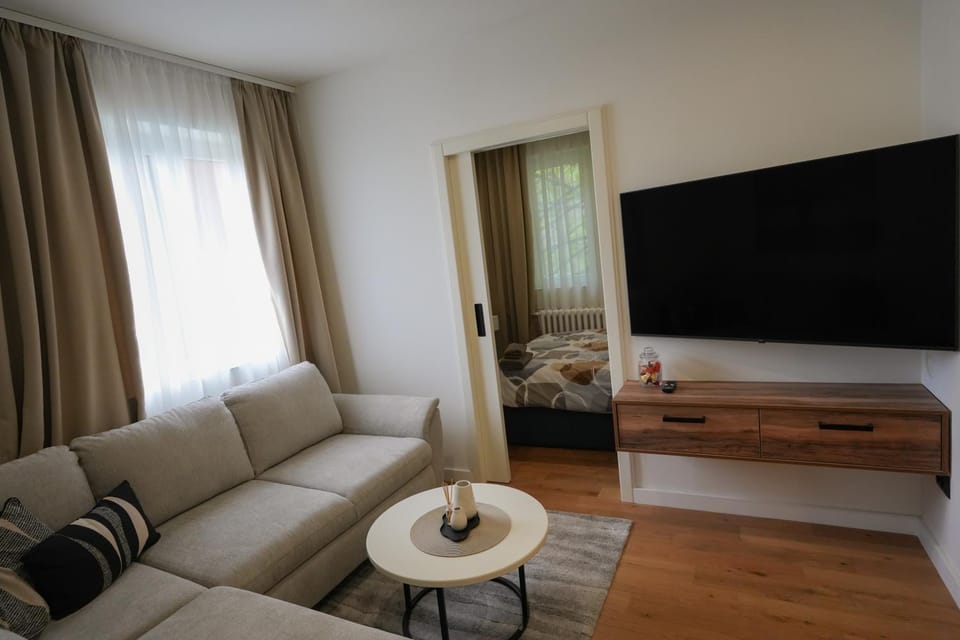 Communal lounge/ TV room, Bed, Living room, Seating area, Bedroom