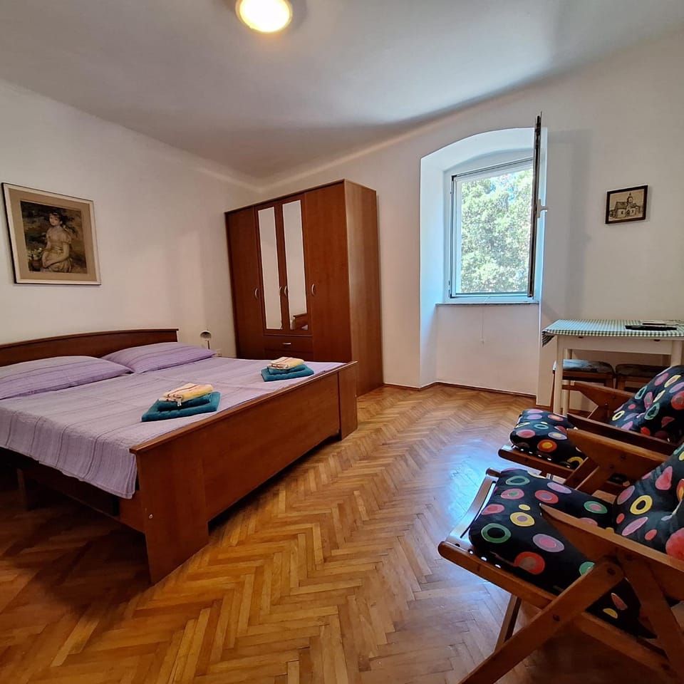 Bed, Living room, Seating area, Bedroom, towels, wardrobe