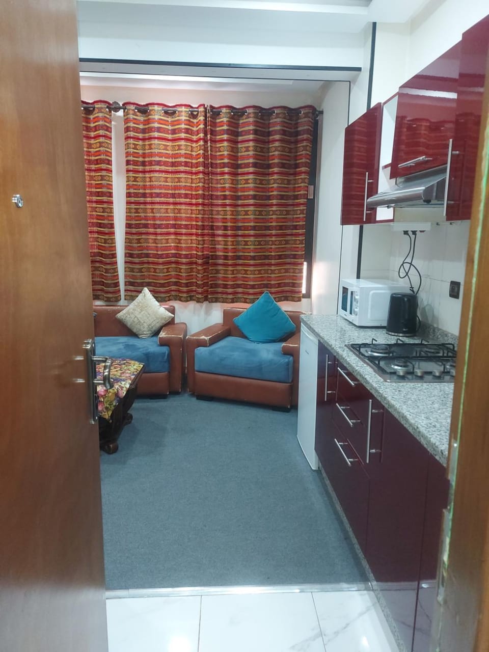Kitchen or kitchenette, Living room, stove