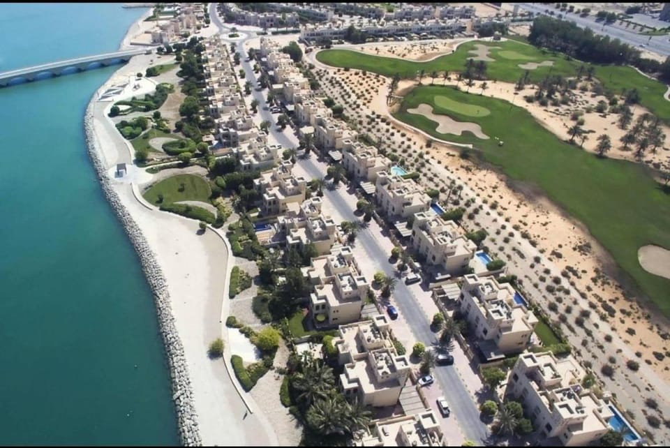 Private Beach 1BR-Yacht Club-Work Space-Pool-Gym Apartment in Ras al Khaimah