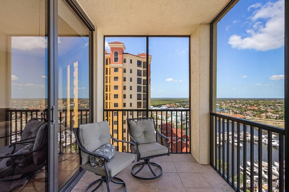 Luxurious High-Rise Haven with Balcony - Condo Cape Escape - Roelens Vacations House in Cape Coral